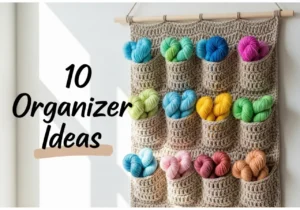 Handmade crochet wall organizer in neutral yarn with multiple storage pockets