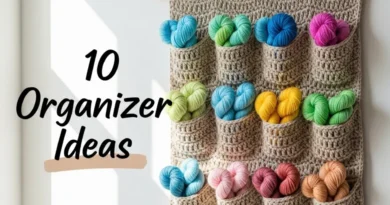 Handmade crochet wall organizer in neutral yarn with multiple storage pockets