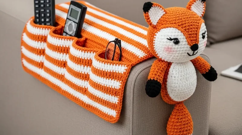 Crochet Sofa Arm Organizer Pattern with orange and white stripes and a fox amigurumi decoration
