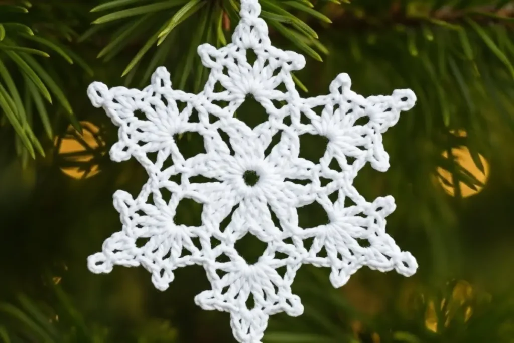 crochet snowflake pattern made with white yarn