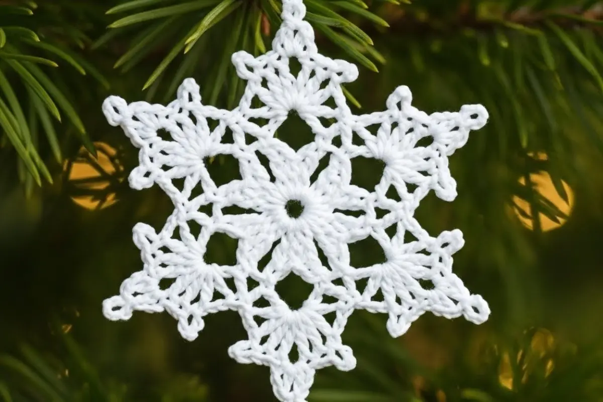 crochet snowflake pattern made with white yarn