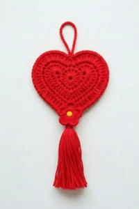 Crochet heart hanging ornament with tassel made in cotton yarn